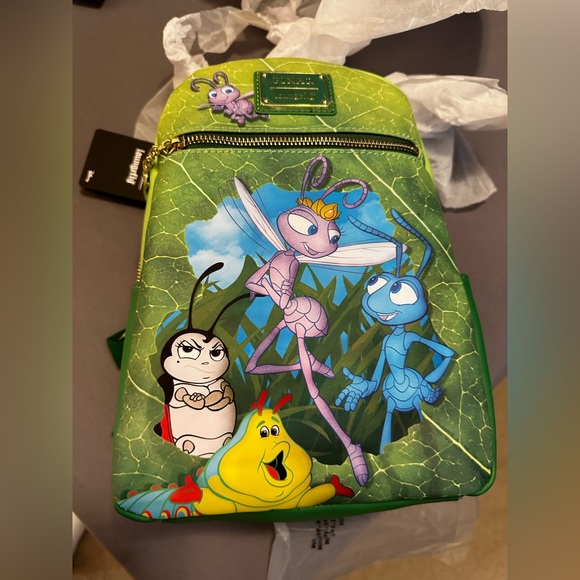 Loungefly Handbags - A Bugs life Loungefly backpack nwt